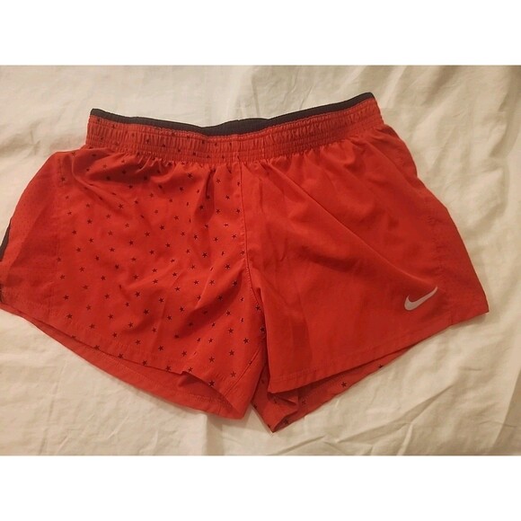 Nike Women's Dri-Fit Running Shorts Red Navy Blue Stars EUC Lined Drawstring M - Picture 1 of 5